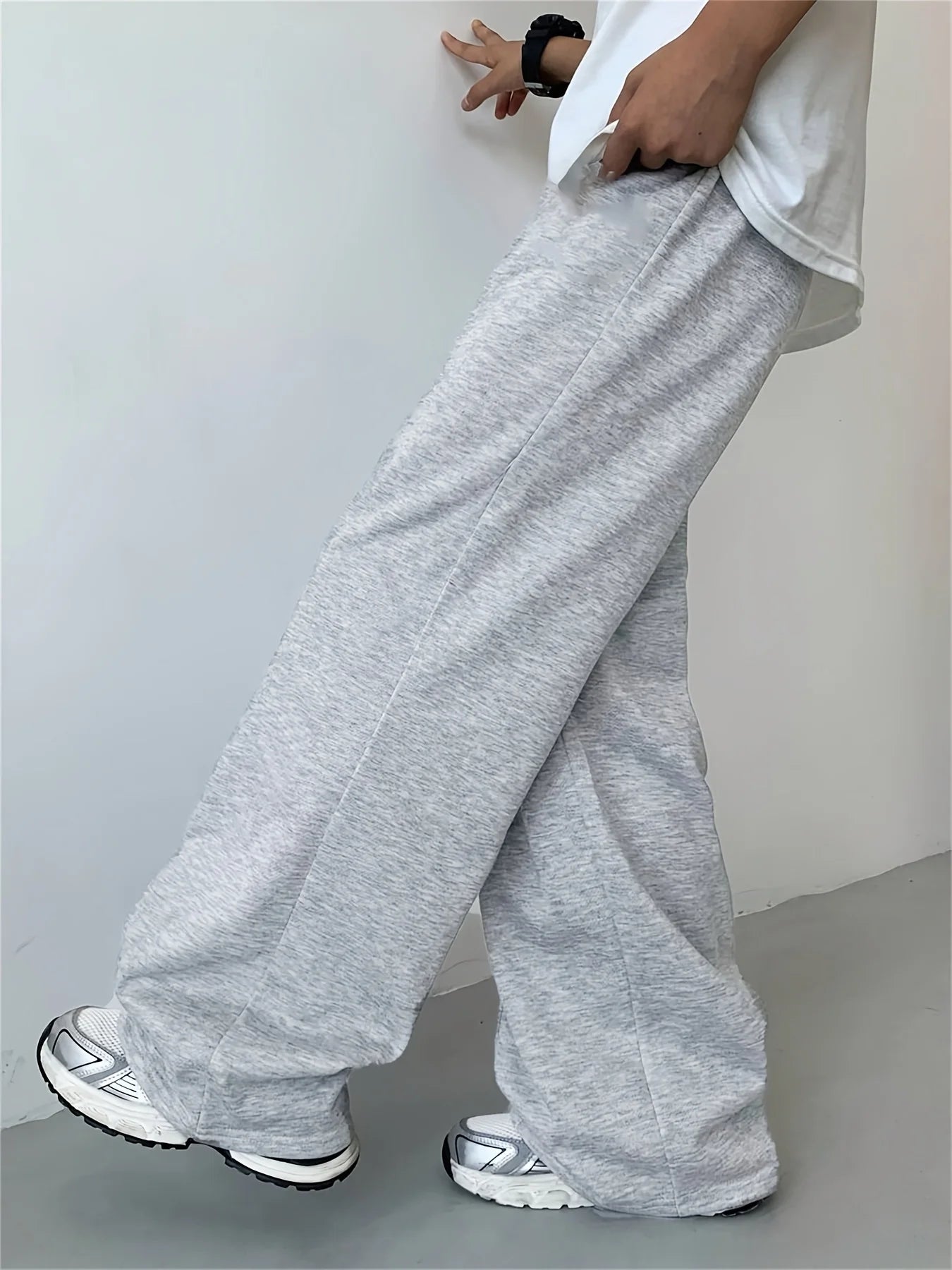 Loose, straight-leg gray trousers. Soft, everyday pants. Unisex sweatpants. All-season cotton streetwear. pants men